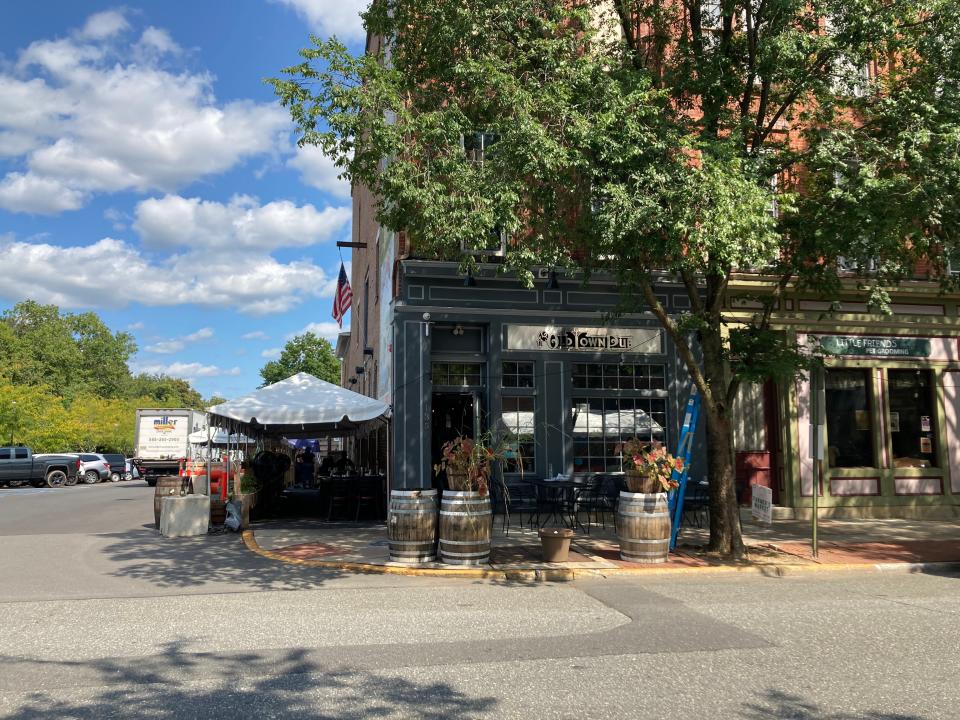 Old Town Pub has a large outdoor setup as well as cozy seating inside.