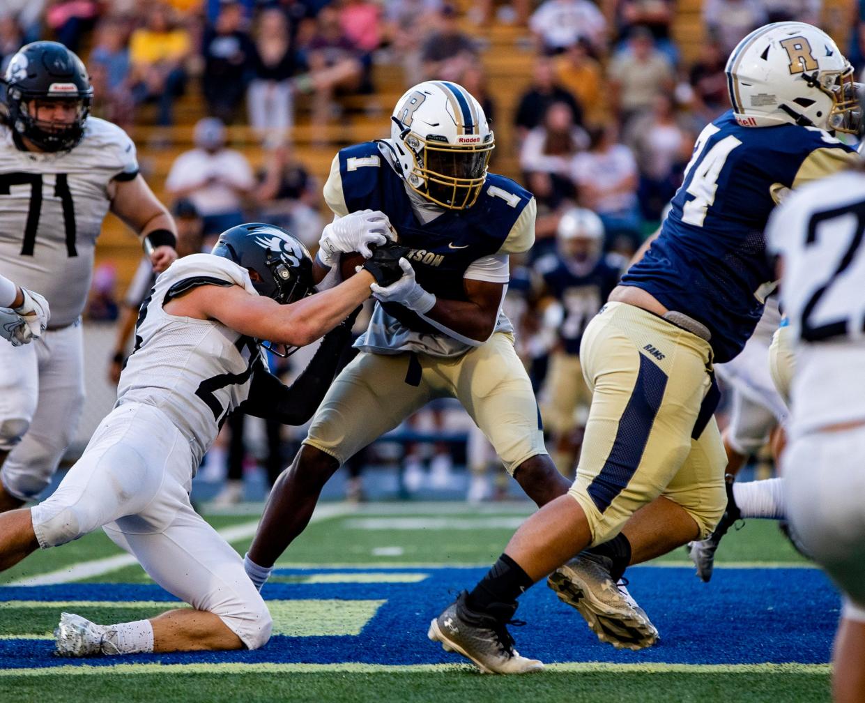 TC Roberson junior running back Tyrin Credle runs the ball against North Buncombe Friday evening at TC Roberson High School in Arden, NC. TC defeated North Buncombe 49-0.