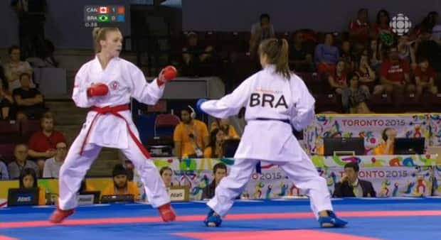 Canadian karate practitioner Kate Campbell, left, has not been able to compete since the COVID-19 pandemic began. (CBC - image credit)