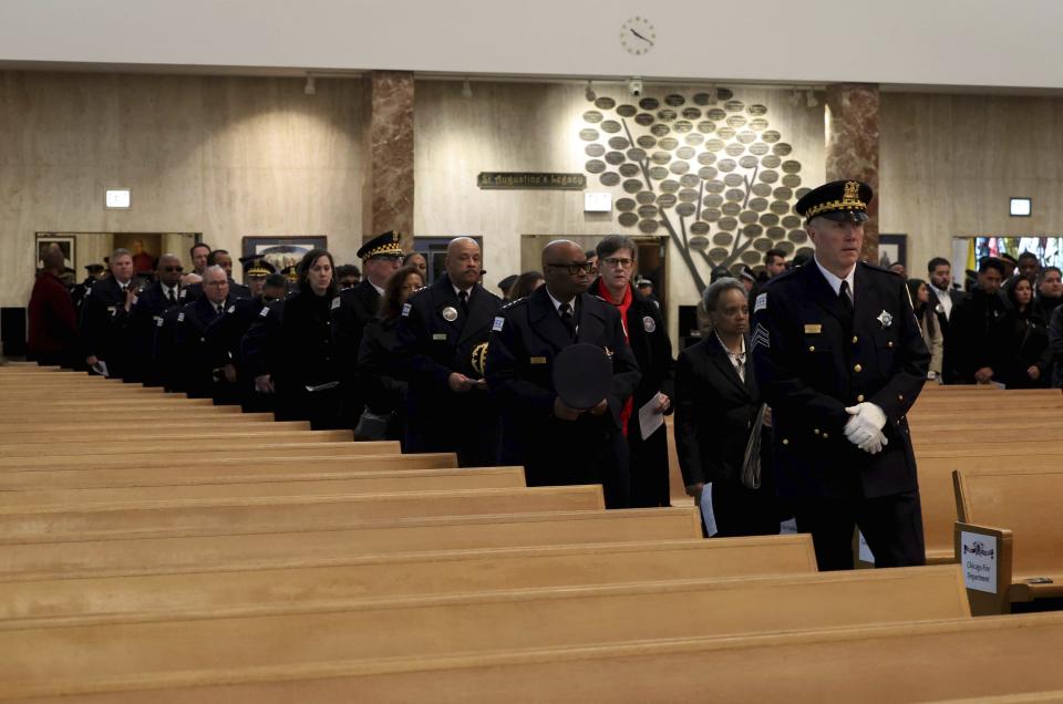Chicago police Superintendent David Brown and Mayor Lori Lightfoot arrive for the funeral Mass for Chicago police Officer Andres Vasquez-Lasso at St. Rita of Cascia Shrine Chapel on Thursday, March 9, 2023 in Chicago. Vasquez-Lasso was shot and killed as he responded to reports of a man chasing a woman with a gun in Gage Park. (Stacey Wescott/Chicago Tribune via AP, Pool)