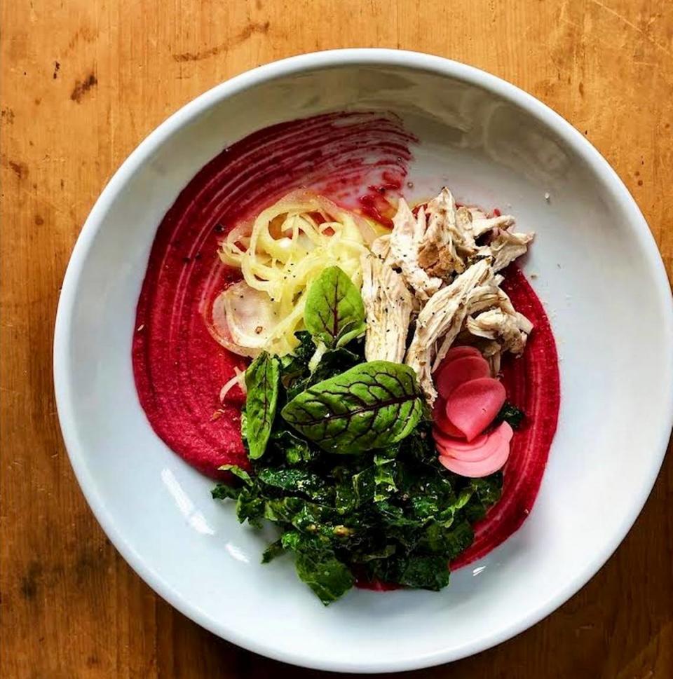 The “Favorite Bowl” at James Provisions has olive oil poached chicken, forbidden rice, beet hummus, kale, fennel and pickled radishes.