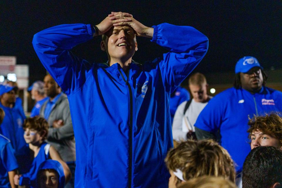 Hamilton Southeastern Royals' head coach Michael Kelly takes a moment Friday, Nov. 4, 2022, to take in his team's 35-13 victory over the Fishers Tigers at Fishers High School. 