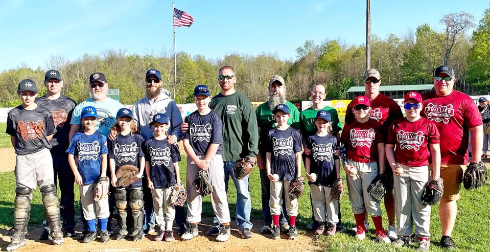 Opening Day of the 2023 Honesdale Little Baseball Association went off without a hitch Monday evening under blue skies at the Scott Kinzinger Memorial Complex. Pictured here are local veterans who threw out ceremonial first pitches to current players. Pictured are (first row, from left): Scott Wentzel, Emily Leopardi, Alexander Engvaldsen, Ashlyn Engvaldsen, Patrick Gardner, Amilia LaTournous, Joseph LaTournous, Kaylem Kresge, Jacob Gilbert. Standing are: Paul Bunting, John DeYoung, Adam Engvaldsen, Rick Gardner, Patrick LaTournous, Fawn LaTournous, Steve Gallik, Matt Gilbert.
