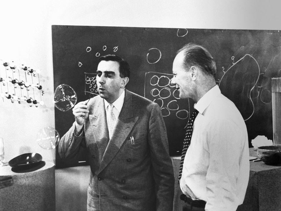 Physicist Edward Teller blowing soap bubbles in his laboratory.