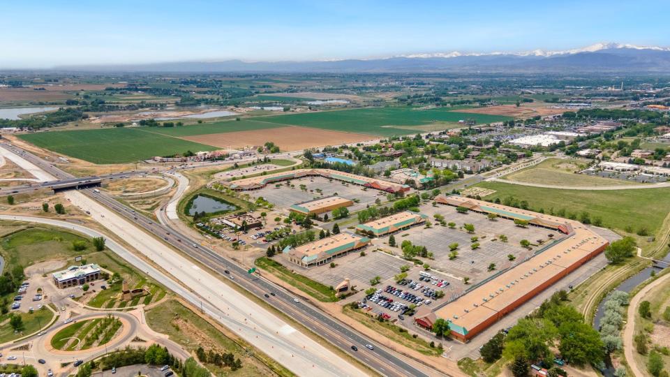 An aerial view shows Loveland Yards at the intersection of Interstate 25 and U.S. Highway 34 in Loveland. The former Loveland Outlets have been sold and are being rebranded as a combination of retail, office and flex space.