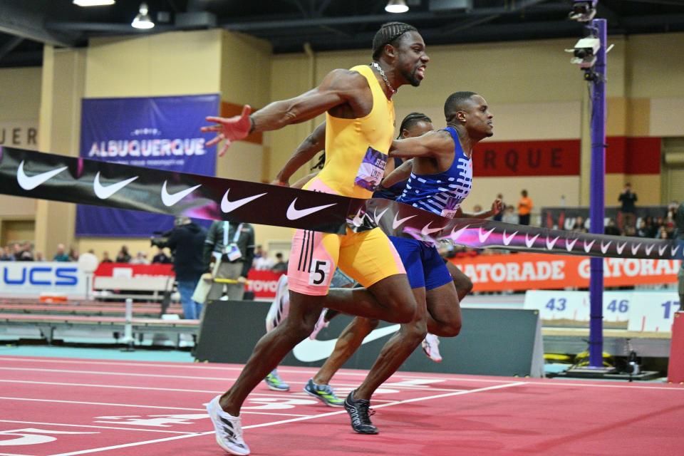 Noah Lyles (left) defeats Christian Coleman by .01 seconds to win the men's 60-meter dash final during the 2024 USATF Indoor Championships in Albuquerque, New Mexico.