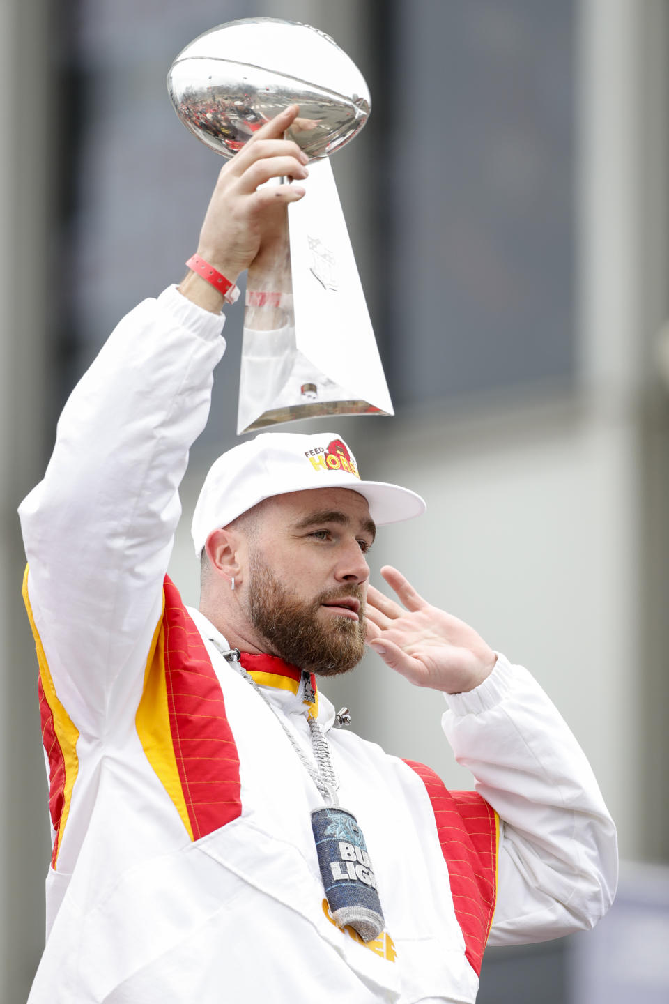 Travis Kelce takes part in the Kansas City Chiefs' victory celebration and parade in Kansas City, Mo., Wednesday, Feb. 15, 2023, following the Chiefs' win over the Philadelphia Eagles Sunday in the NFL Super Bowl 57 football game. (AP Photo/Colin E. Braley)
