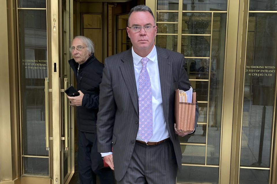 Timothy Shea leaves Manhattan federal court minutes after a jury convicted him of conspiracy and obstruction of justice charges in an online campaign that raised $25 million to build a wall along the U.S. southern border, Friday, Oct. 28, 2022, in New York. The campaign promised that every cent donated would go to the wall construction but prosecutors say Shea and three other fund organizers siphoned off hundreds of thousands of dollars for themselves. (AP Photo/Larry Neumeister)