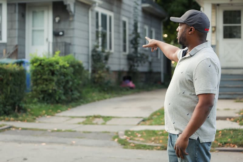 Silvon Simmons points to driveway where he was shot by police in Rochester, New York