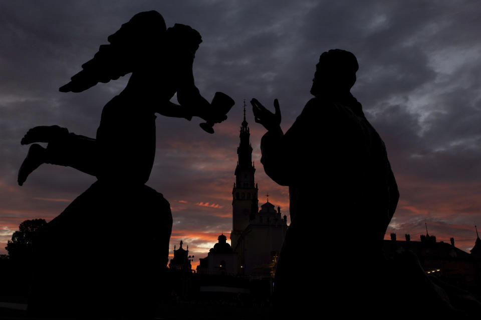 The Jasna Gora Monastery, Poland's most revered Catholic shrine, during a sunset in Czestochowa, Poland, Saturday, Sept. 23, 2023. As the ruling conservative Law and Justice party seeks to win an unprecedented third straight term in the Oct. 15 parliamentary election, it has sought to bolster its image as a defender of Christian values and traditional morality. Yet more and more Poles appear to be questioning their relationship with the Catholic church, and some cite its closeness to the government as a key reason. (AP Photo/Michal Dyjuk)
