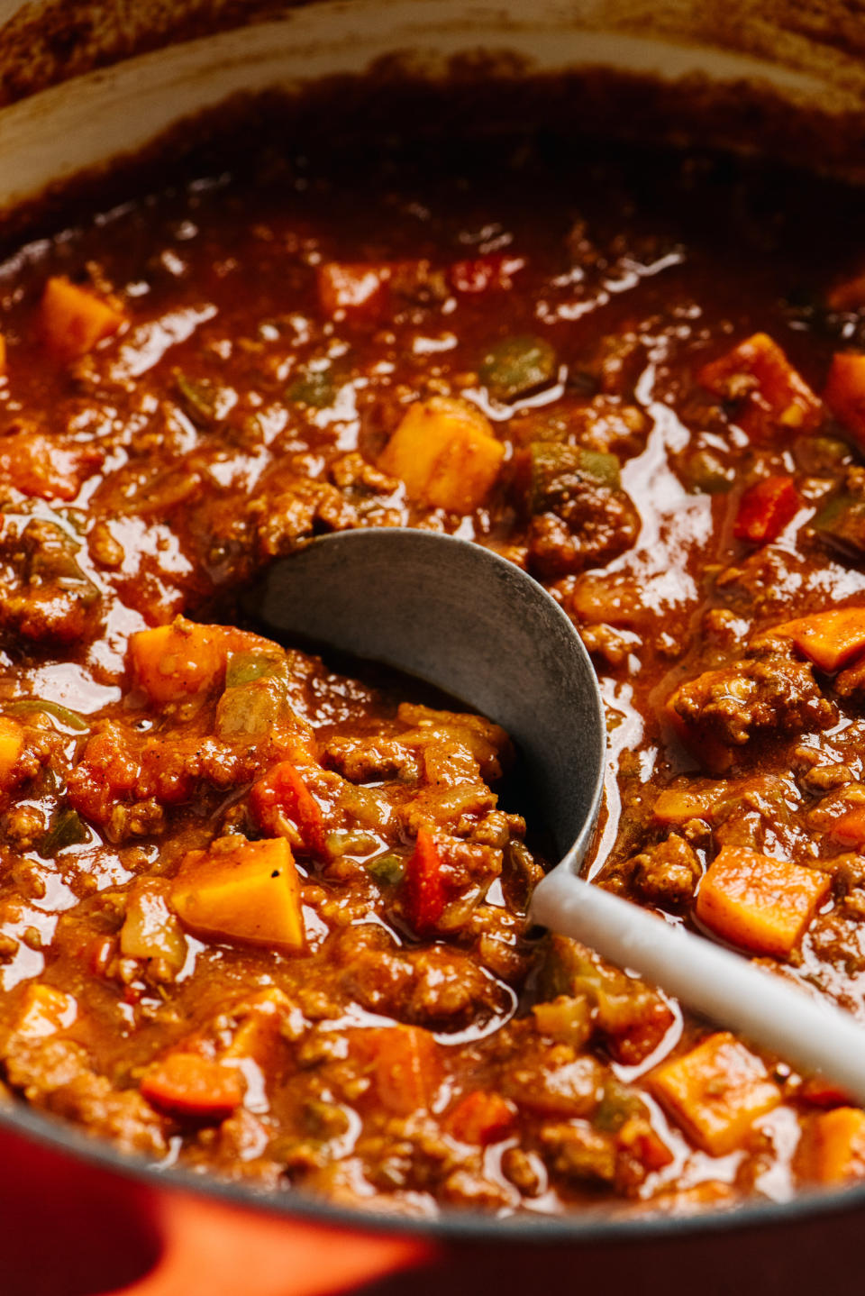 Chili con carne cooking in a dutch oven.