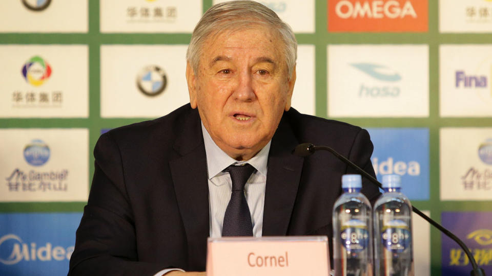 Cornel Marculescu speaks at a press conference at the swimming world championships.  (Photo by VCG/VCG via Getty Images)