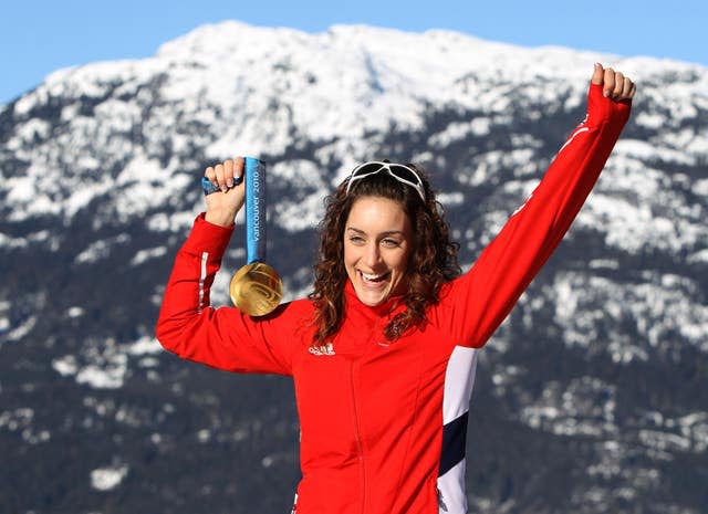 Amy Williams poses with her Olympic gold medal