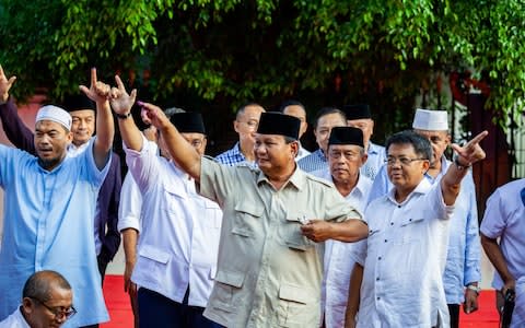 Rival candidate Prabowo Subianto has claimed victory based on his own polling - Credit: Andri Tambunan/Bloomberg