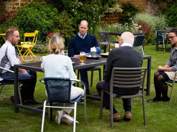 The Duke of Cambridge talks to the landlords and workers at The Rose and Crown pub in Snettisham, Norfolk. (PA)