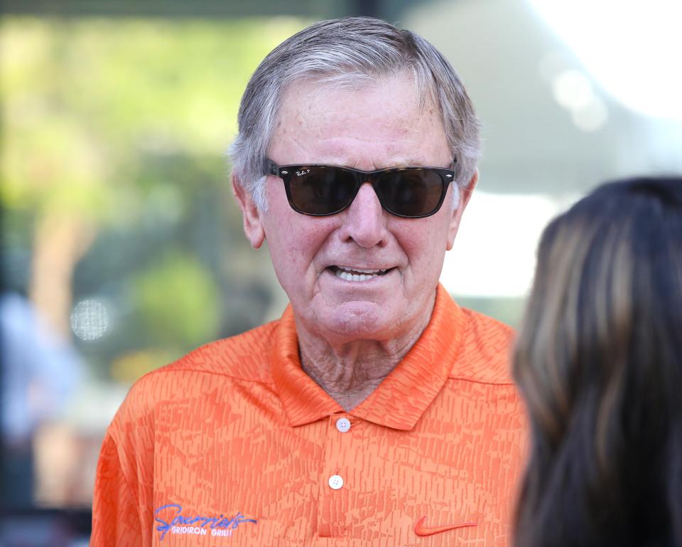 Legendary Florida Gators head ball coach Steve Spurrier talks with members of the media during a ceremony to officially opening his new restaurant Spurrier's Gridiron Grille in Celebration Pointe, in Gainesville, Fla., Aug. 10, 2021.