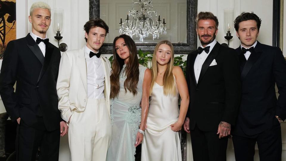 The Beckham family pose in black tie attire at Victoria's 50th birthday party