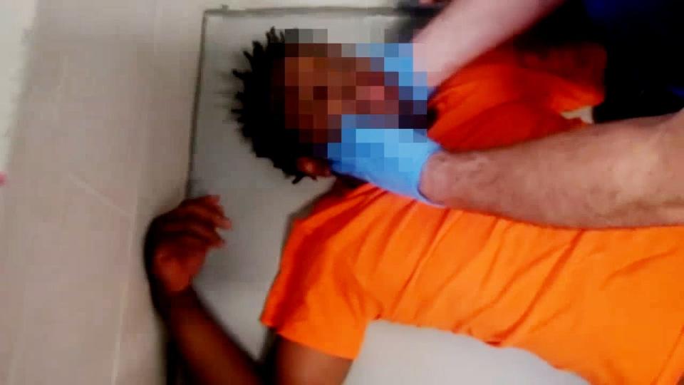 An image taken from a video inside the Franklin County Juvenile Intervention Center shows Damarion Allen, 15, lying on his cell floor after a May 7 fight that paralyzed him from the chest down. Franklin County Juvenile Court and the county Prosecutor's Office, which represents the court and the county on legal matters, blurred out Allen's face on the video provided in response to a public records request from The Dispatch. The county also redacted Allen's audio conversation with a nurse where he expressed concern that he may be paralyzed.