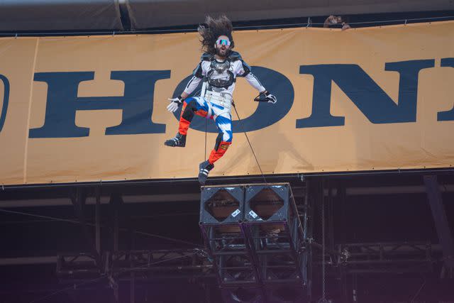 <p>Amy Harris/Shutterstock</p> Jared Leto bungee jumping at ACL Music Festival