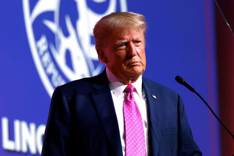 FILE PHOTO: Former U.S. President Donald Trump attends the Oakland County GOP Lincoln Day Dinner