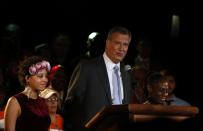 Democratic candidate for New York City mayor Bill de Blasio stands with his wife Chirlane and his daughter Chiara during his mayoral primary results party in New York September 10, 2013. Exit polls showed Public Advocate de Blasio won the most votes in the New York City Democratic mayoral primary on Tuesday. (REUTERS/Shannon Stapleton)