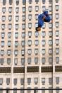 Martin Chamberlain, Freerunner in Front of the Shell Building, London. Living The View adult class.