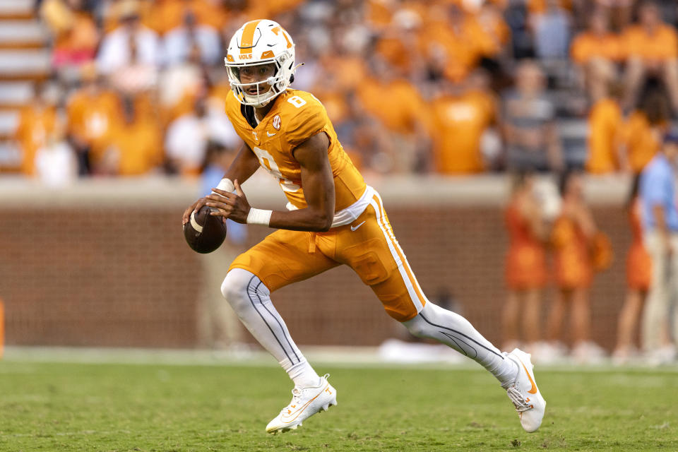 Tennessee quarterback Nico Iamaleava (8) looks for a receiver as he rolls out to pass during the second half of an NCAA college football game against UTSA, Saturday, Sept. 23, 2023, in Knoxville, Tenn. (AP Photo/Wade Payne)