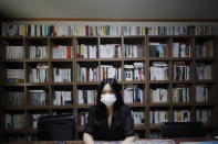 Han Shin Bi, a high school senior in Seoul, wearing a face mask speaks during an interview in Seoul, South Korea, on Sept. 18, 2020. “Online classes were really inconvenient,” said Han. Experts say the reduced interaction with teachers, digital distractions and technical difficulties are widening the education achievement gap among students in South Korea, leaving those less well off, like Han, at even more at a disadvantage. (AP Photo/Lee Jin-man)
