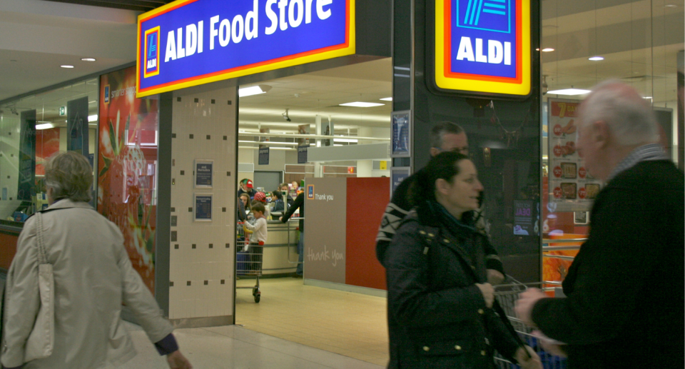 Shoppers outside an Aldi store.