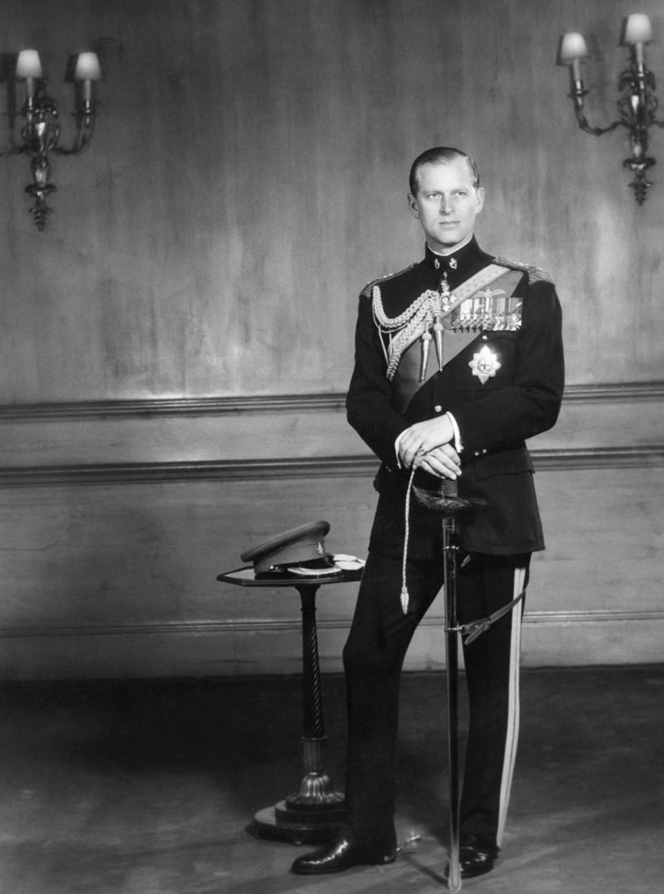 FILE - In this June 10, 1956 file photo, the Duke of Edinburgh poses for a photo as he observes his 35th birthday anniversary in Buckingham Palace, London. Buckingham Palace says Prince Philip, husband of Queen Elizabeth II, has died aged 99. (AP Photo/File)