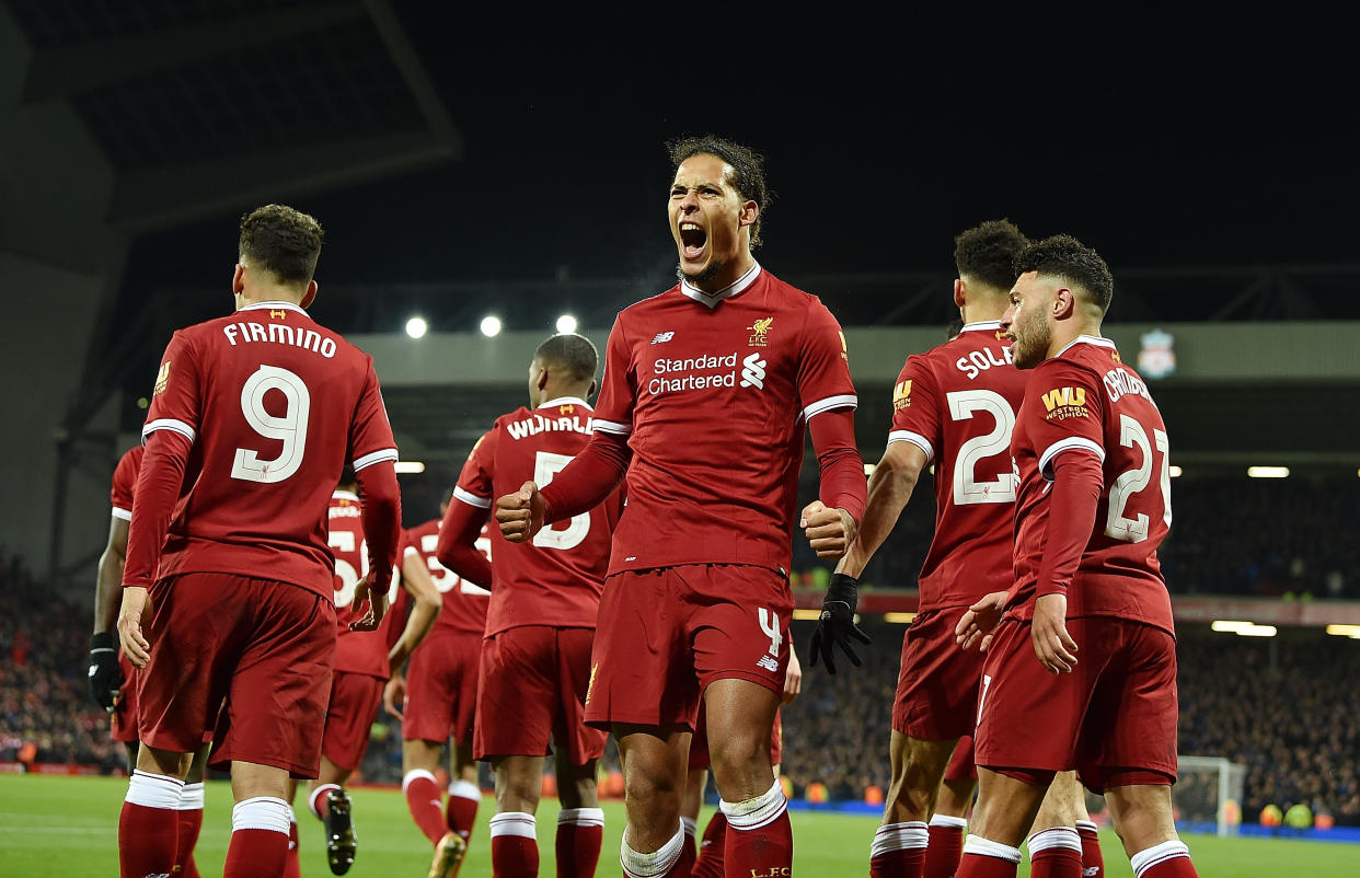 Virgil Van Dijk celebrates his goal for Liverpool against Everton in the third round of the FA Cup on Friday. (Getty)