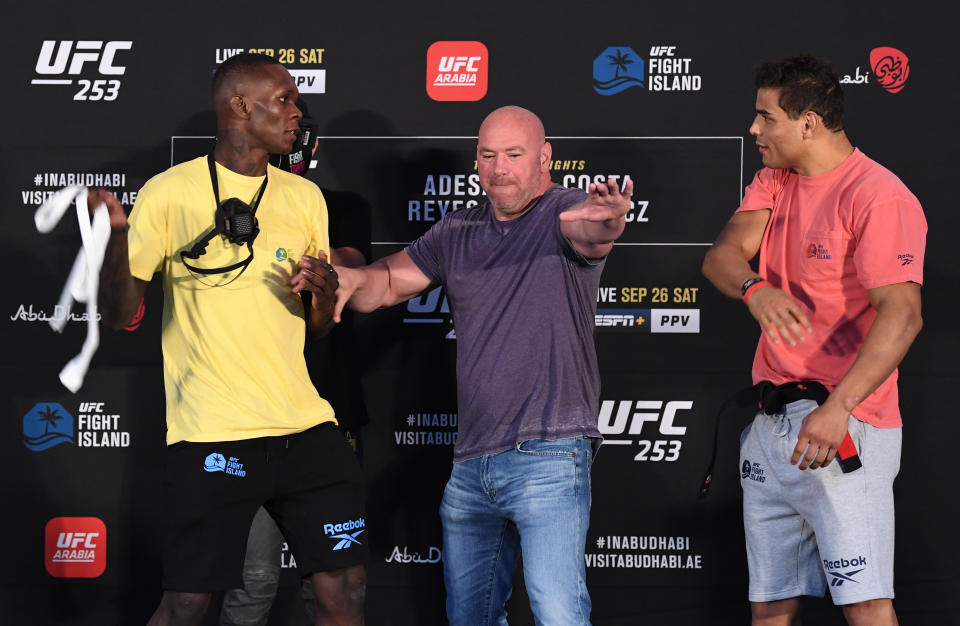 Israel Adesanya (left) and Paulo Costa  face off during the UFC 253 weigh-ins. (Photo by Josh Hedges/Zuffa LLC via Getty Images)