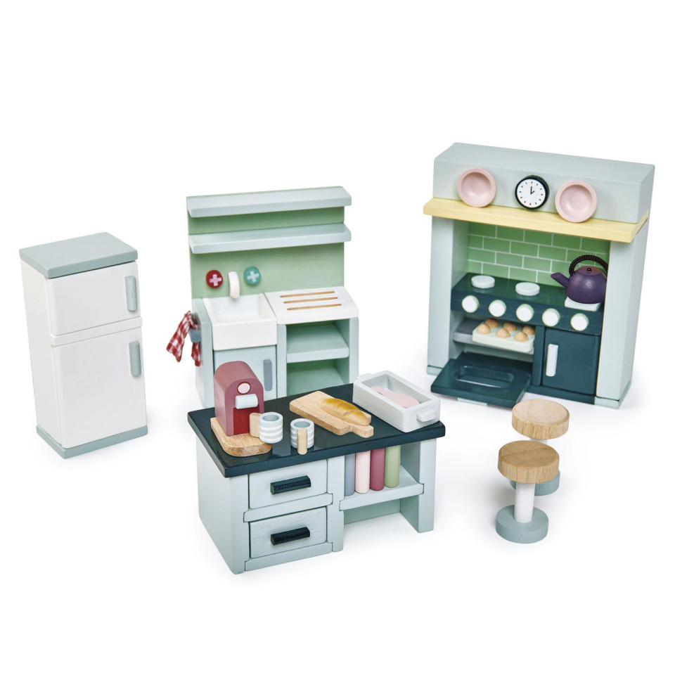 This photo released by Tender Leaf Toys shows the wooden toy Dovetail Kitchen Set. Lots of wooden play kitchens and toy appliances are out there, but they’ve got a lot of plastic competition. Best to check with a parent first before taking on the big ticket. If you’re not confident about gifting a full-size kitchen, go for a miniature set. (AP Photo/Tender Leaf Toys)