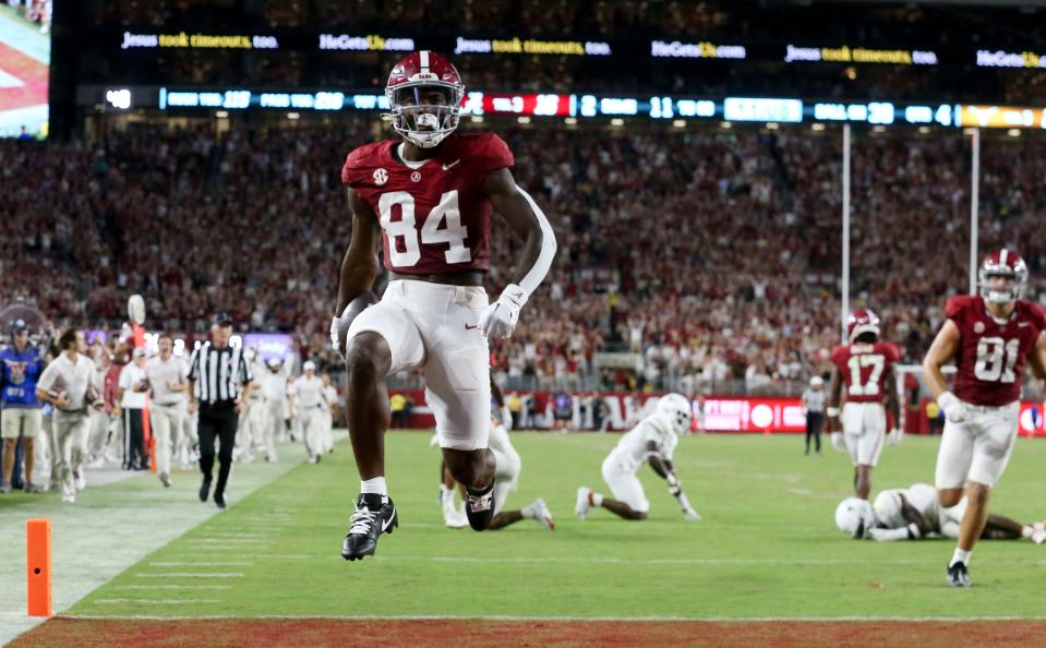 Alabama tight end Amari Niblack leaps into the end zone during the Crimson Tide's 34-24 loss to Texas on Sept. 9. Niblack announced his transfer to Texas on Thursday night, making him the third former Alabama player to transfer to the Longhorns since head coach Nick Saban's retirement.