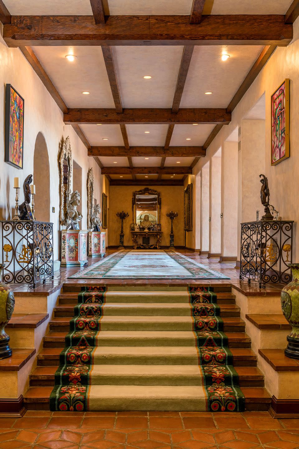 5) The main level hallway is a staggering 82 feet long, leading up to the 32-foot billiard room, which is open to the main hallway.