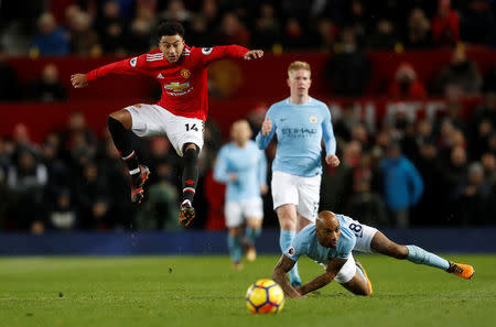 Soccer Football - Premier League - Manchester United vs Manchester City - Old Trafford, Manchester, Britain - December 10, 2017 Manchester United's Jesse Lingard in action with Manchester City's Fabian Delph Action Images via Reuters/Carl Recine