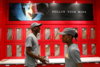 Employees work at the Kellogg's NYC cafe in Midtown Manhattan in New York City, U.S., June 29, 2016. REUTERS/Brendan McDermid