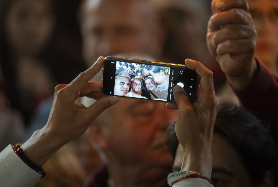 Péter Magyar, a former Fidesz insider that broke ranks with the party in February, takes a selfie with his followers during a campaign rally in Vac, Hungary, on May 18, 2024. Magyar, 43, seized on growing disenchantment with the populist Prime Minister Viktor Orbán, building a political movement that in only a matter of weeks looks poised to become Hungary's largest opposition force. (AP Photo/Denes Erdos)