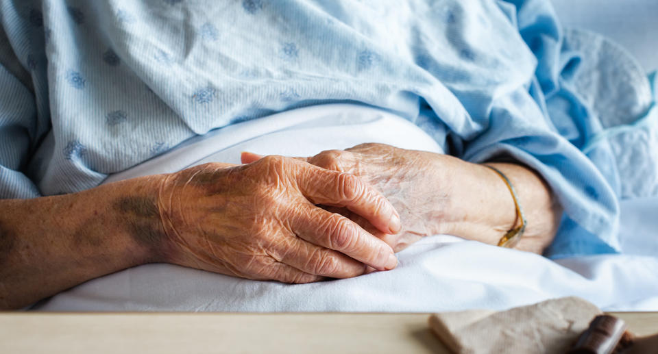 The hands of an elderly person in hosptial.