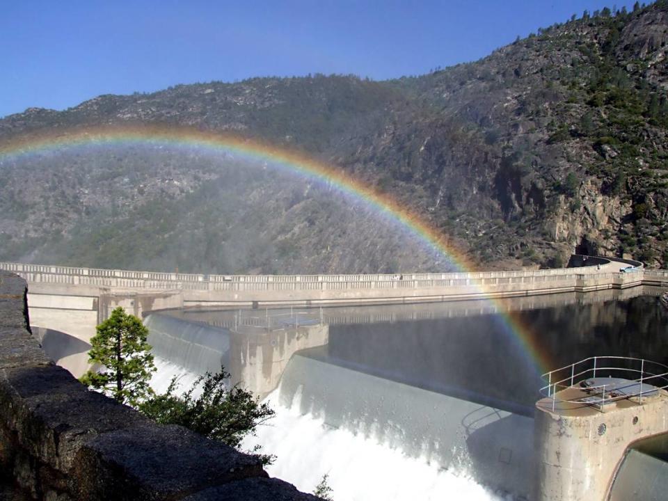 A rainbow forms in the mist from water releases at Hetch Hetchy Reservoir, owned by San Francisco. John Holland/Modesto Bee File