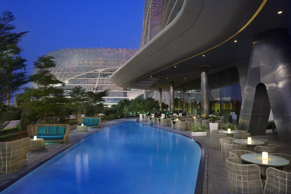 a pool with a building in the background