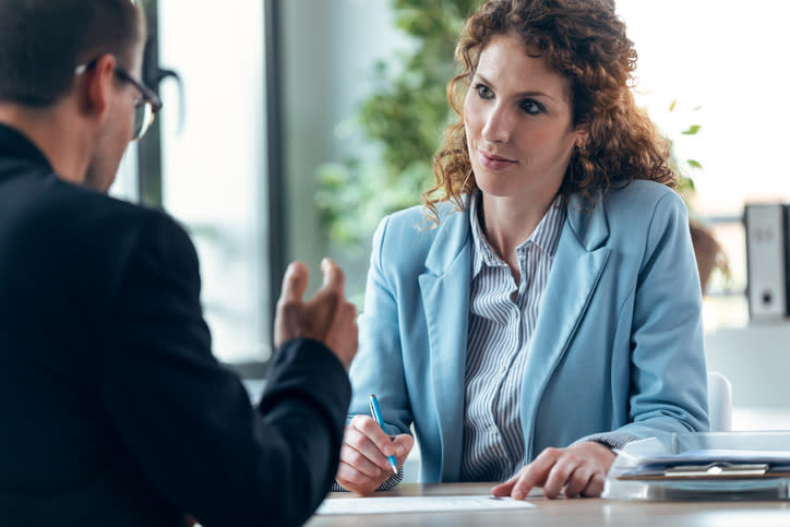 A financial advisor working with a client to create a retirement plan.