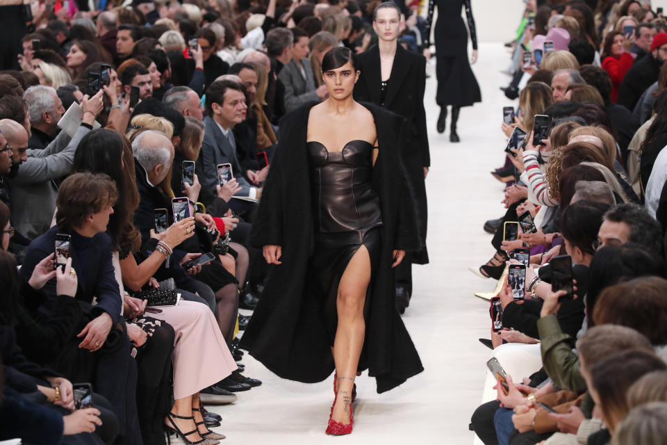 A model wears a creation for the Valentino fashion collection during Women's fashion week Fall/Winter 2020/21 presented in Paris, Sunday, March 1, 2020. (AP Photo/Francois Mori)