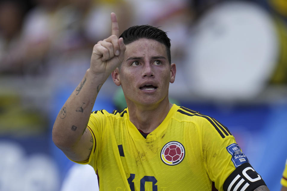 Colombia's James Rodriguez celebrates scoring the opening goal during a qualifying soccer match for the FIFA World Cup 2026 between Colombia and Uruguay at the Metropolitano stadium in Barranquilla, Colombia, Thursday, Oct. 12, 2023. (AP Photo/Fernando Vergara)