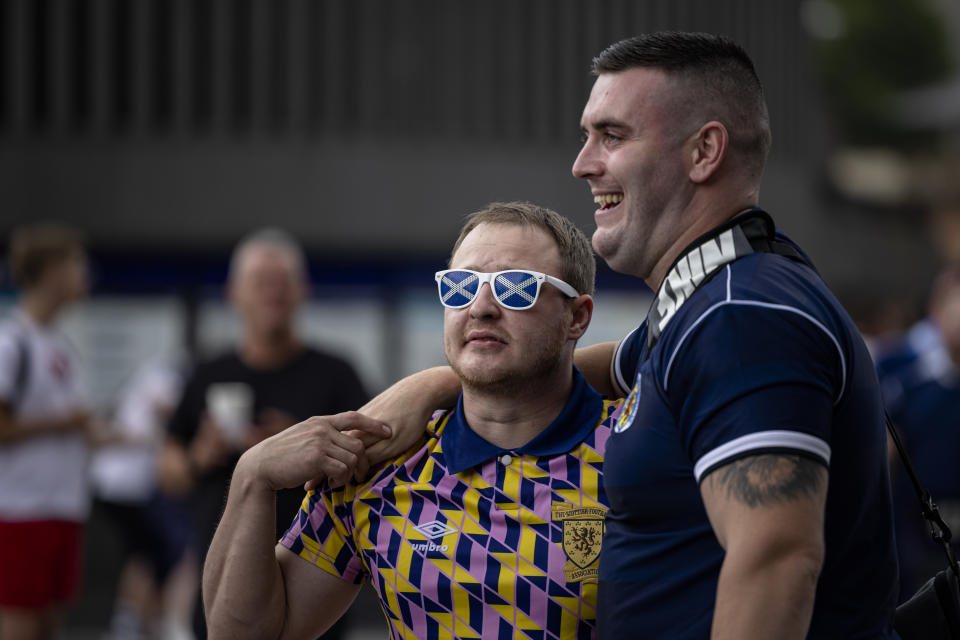 LONDON, ENGLAND - JUNE 17: A Scotland fans wears a pair of sunglasses with the flag of Scotland outside King's Cross Station on June 17, 2021 in London, England. Officials in Scotland and London, where the match will be hosted at Wembley Stadium, have discouraged Scottish fans without tickets to the game of coming south, due to concerns about the spread of Covid-19. (Photo by Rob Pinney/Getty Images)