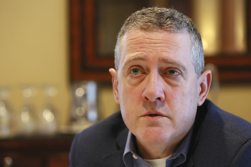 In this Nov. 19, 2019, photo James Bullard, president of the St. Louis Federal Reserve Bank, speaks during an interview in Richmond, Va. (AP Photo/Steve Helber)