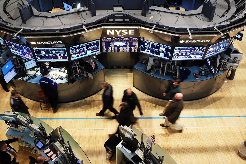 NEW YORK, NY - APRIL 02: Traders exit  the floor of the New York Stock Exchange at the end of the trading day on April 2, 2013 in New York City. The Dow Jones Industrial average and the S&P 500 rose to new record highs on April 2, with the Dow finishing at a record close of 14,662. All three major indexes are up between about 10 percent and 12 precent for the year.  (Photo by Spencer Platt/Getty Images)