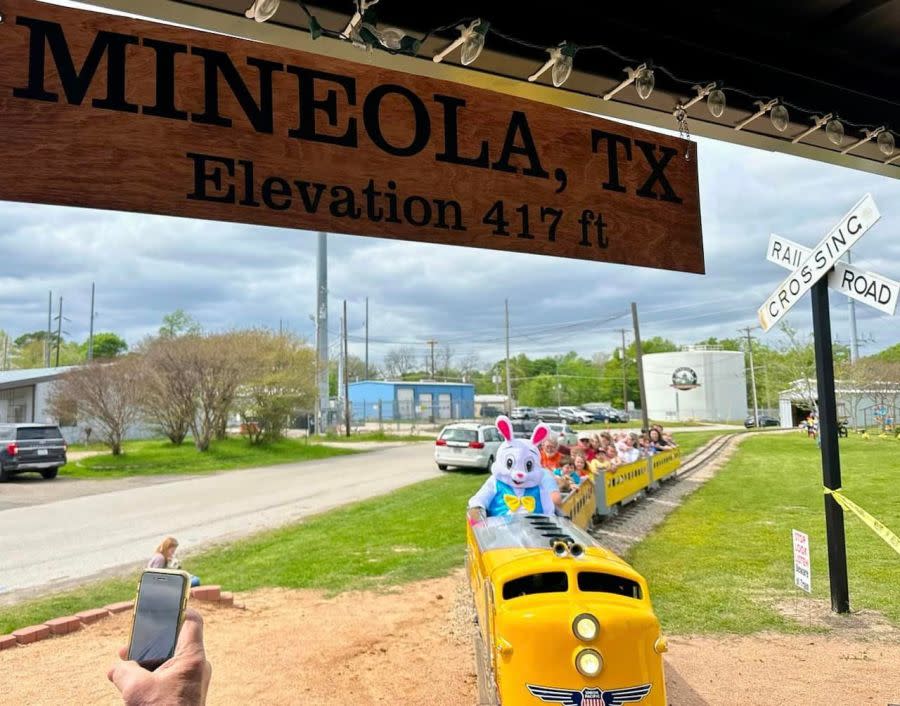 The Easter Bunny driving Mineola's Mini-Train ride.