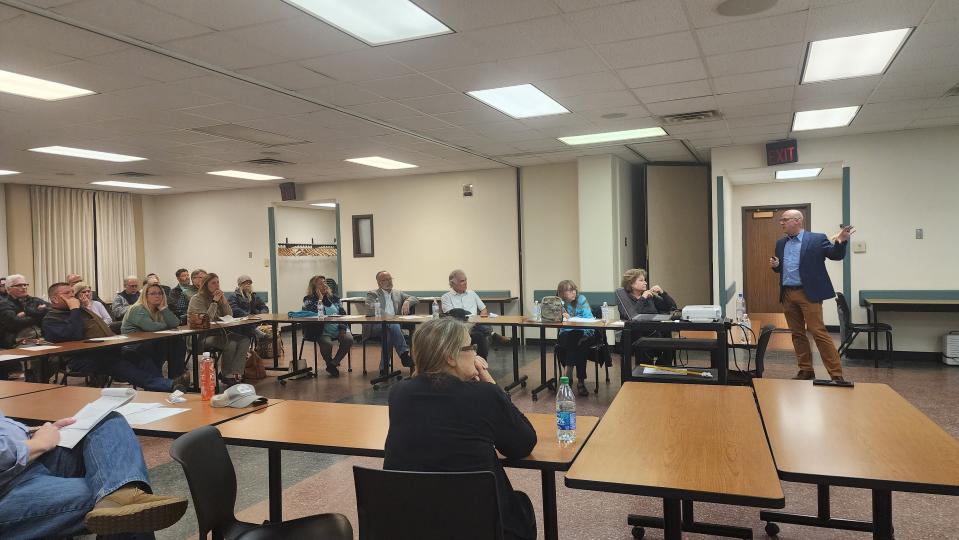 Jason Riddlespurger, director of community development for Amarillo, speaks to the crowd about the proposed Transformation Park project at a community meeting held Thursday at the downtown public library.