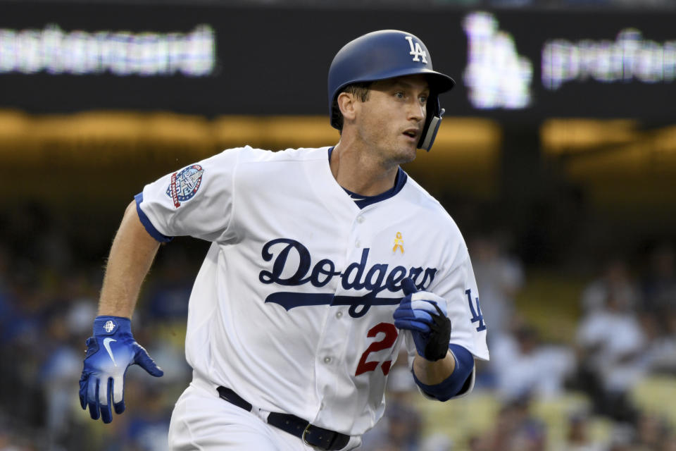 Los Angeles Dodgers' new acquisition David Freese runs to first base after hitting a single in the second inning of a baseball game against the Arizona Diamondbacks, Saturday, Sept. 1, 2018, in Los Angeles. (AP Photo/Michael Owen Baker)